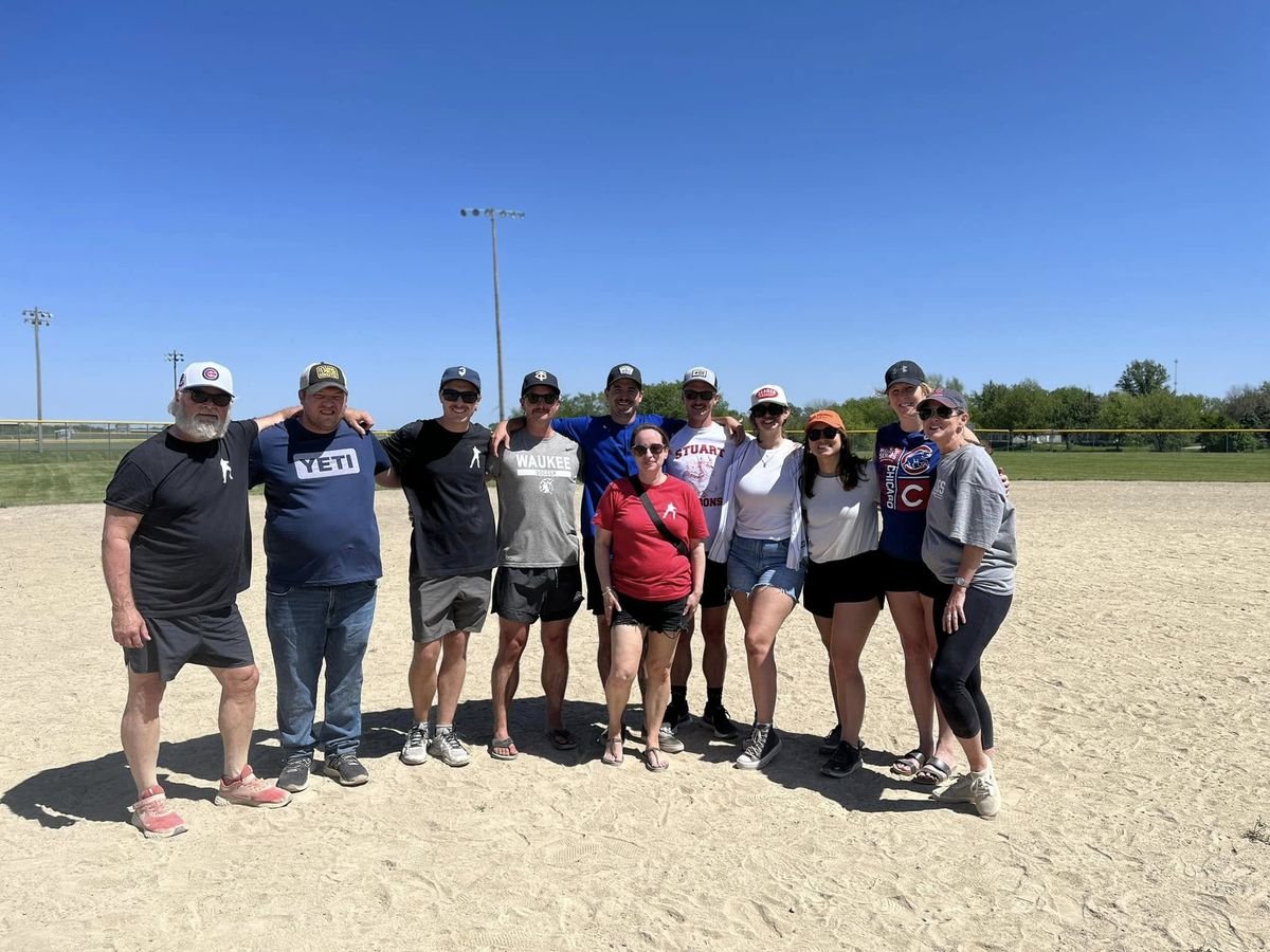 Family and friends on the infield at the Brian Moon Classic